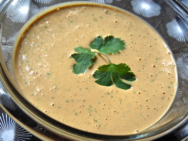 Thai Peanut Sauce in clean bowl and garnished with cilantro